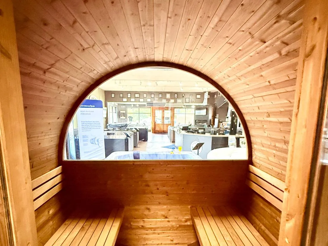 Looking out from inside a cedar barrel sauna on the Smart Enterprises showroom floor in Durango