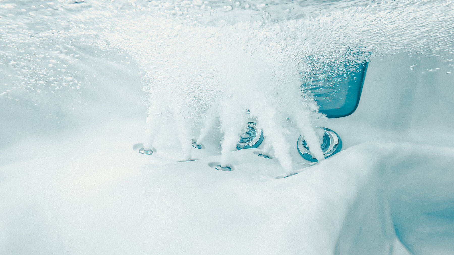 Underwater view of Sundance Cameo leg jets in action